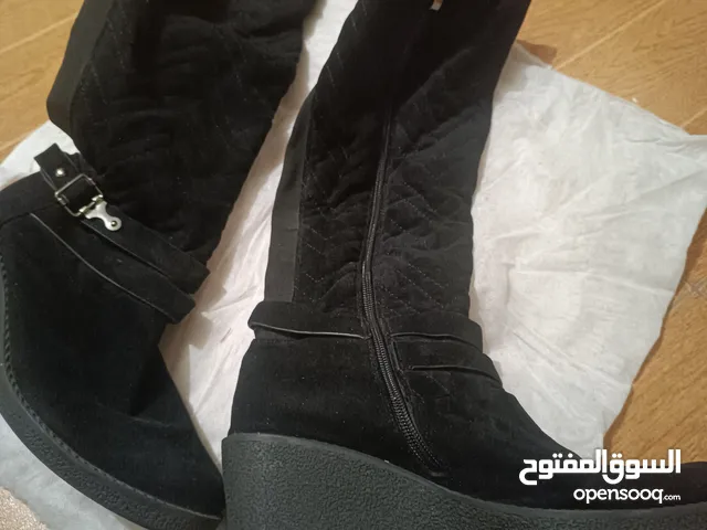 Black Boots in Amman