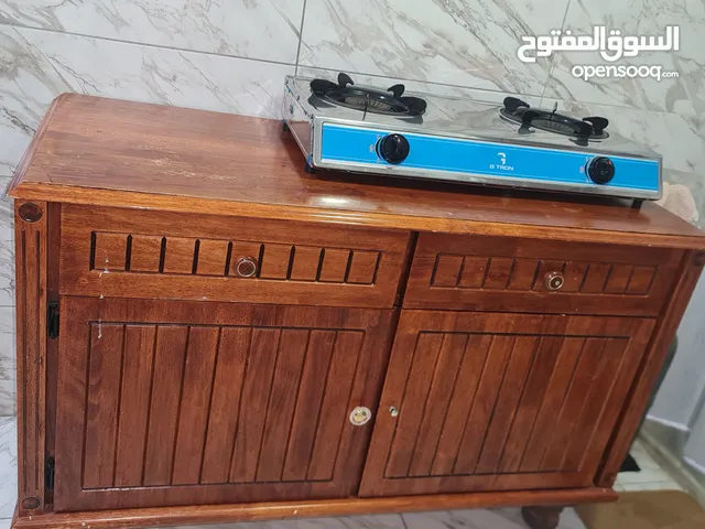 15 kd 2 burner stove + wooden table with drawers&cabinet salmiya block 6