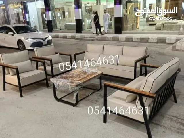 جلسات خارجيه حديد اليدات ملبسه خشب