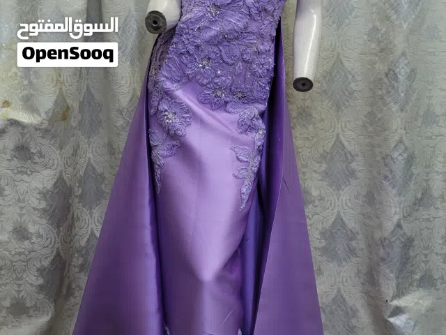 العنوان  فستان سهرة فخم (موف) شغل يدوي - جديد