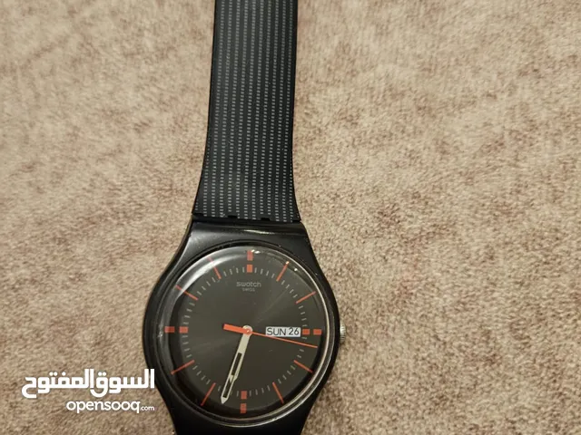 ساعة سواتش جلد اسود
