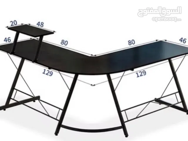 طاوله على شكل حرف L مستعمله من كم شهر