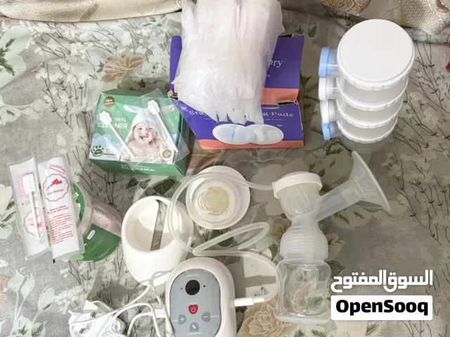 Breast pump(Juniors) and Diaper Changing Table with Freebies
