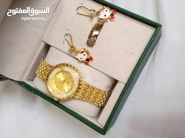 تراجي وحلقه وساعه نسائيه