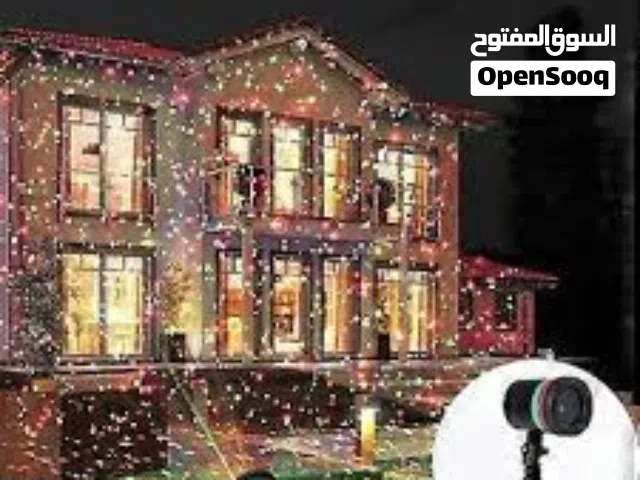 اضاءه ديكور بعيدة المدي داخل المنزل او خارجه او حديقه حبيبات مضيئه تسبح على واجهة العماره او حائ