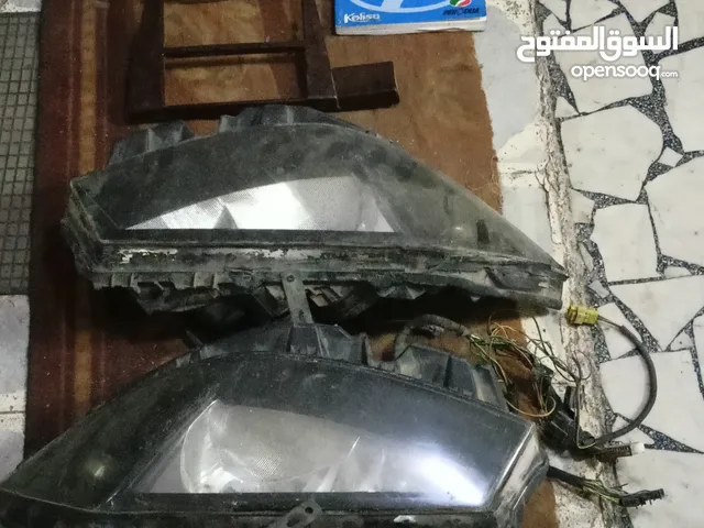+2كشاف امامى رينو ميجان و فبرة نوبيرا عاج و كاتلوجات كليسيا