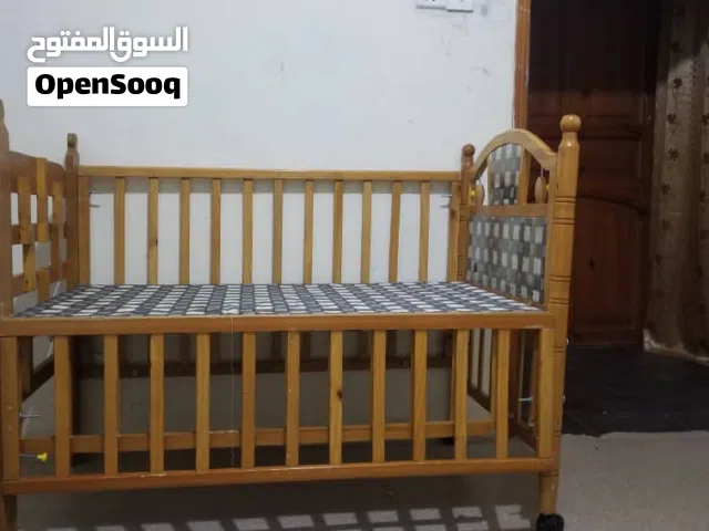 سرير اطفال خشب