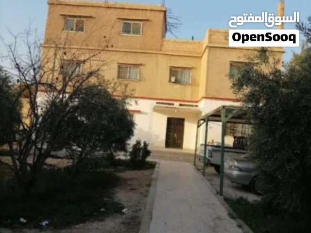 بيت للبيع خمس شقق من افضل مناطق الهاشميه على دلم ارض بسعر الأرض