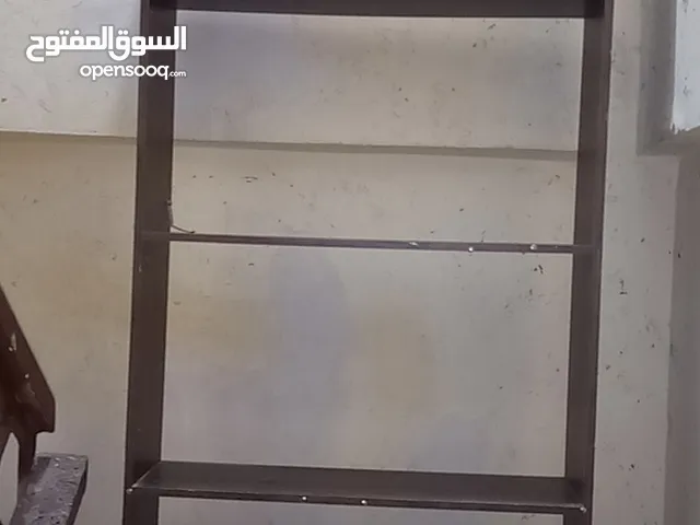 ارفوف خشبيه مكتبه ومحل تجاري ودكان ومحل نثريات