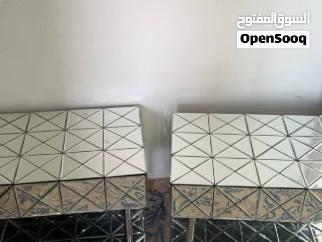 طاولات زجاج مرايا