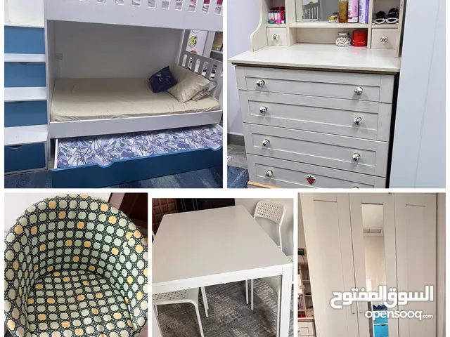 Bunk bed3doors cupboardKids dresser rotating chair and Dinining table with 4 chairs for sale