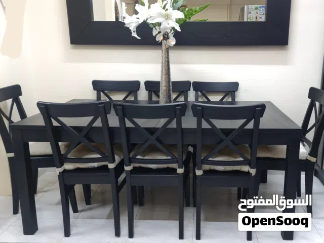 Solid wood Extendable dining table with 8 chairs IKEA like new