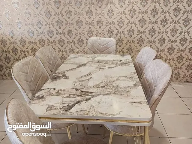 طاولة سفره خشب ارجل ستانلس ستيل و6 كراسي