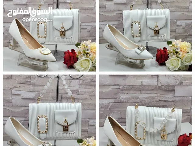 طقم نسائي قطعتين شنطه ماركه ديور حزام طويل جلد اصلي مررررررره حلوه وكيوت مع جزمه شبابي راقي كعب م