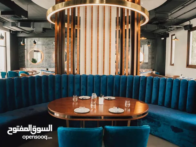 مقهى ومطعم في مدينة أبوظبي يعمل وبدخل ممتاز للبيع