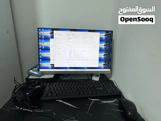 Full setup of desktop 24” with pc and table , everything in picture  60 OMR
