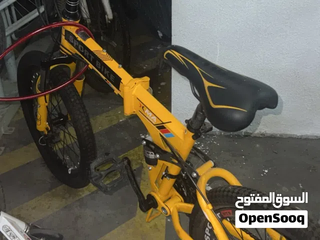 Yellow foldable mountain bike with gears