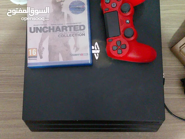 بلاستيشن 4 برو مع يده اصليه وشريط uncharted معاه شاشه