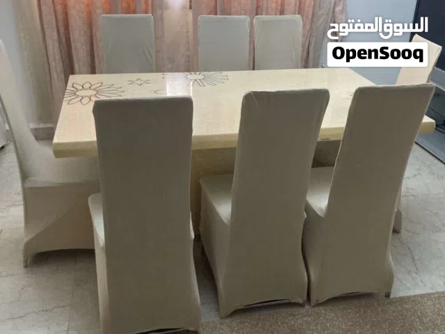 طاولة سيراميك مع الكراسي