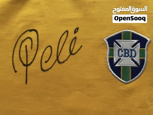 تيشيرت موقع من بيليه وميسي