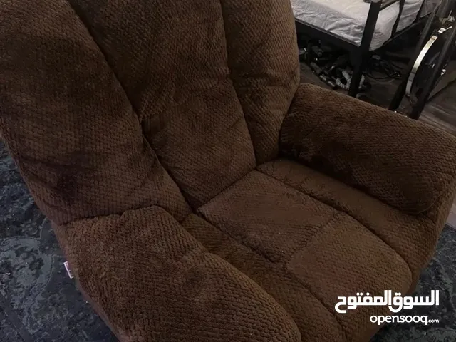 كرسي استرخاء كبير بني