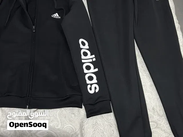 New black adidas Essentials Tracksuit Women
