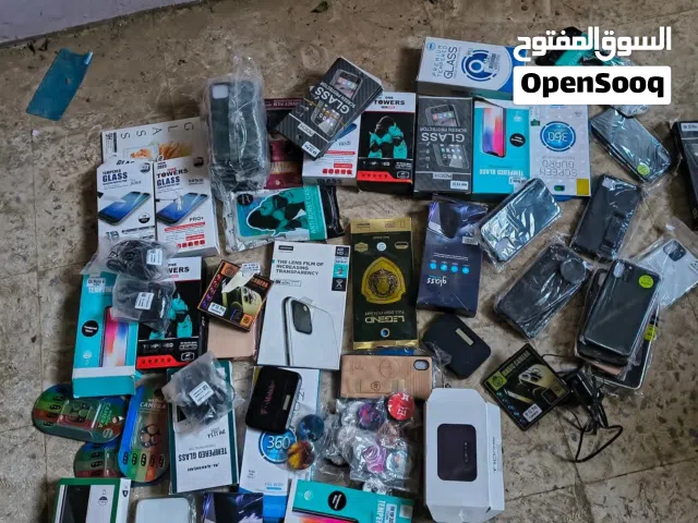 اكسسوارات جوالات عرطه الكميه 10 الف قطعه موجوده معي في المخازن با القراطيس للبيع بنص القيمه