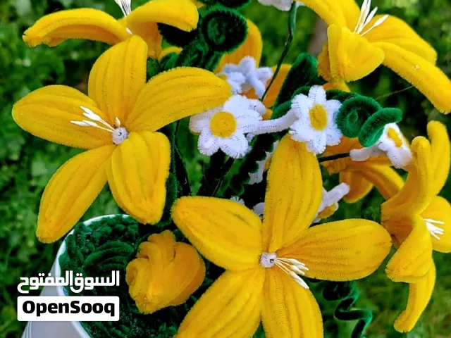 باقات ورد مصنوعه يدويا من خيوط الصوف حسب الطلب الالوان والاشكال والاسعار حرق