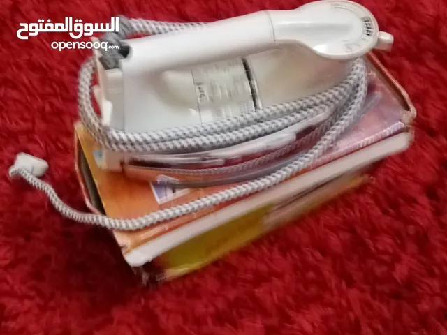 مكواه جديده بالكرتون