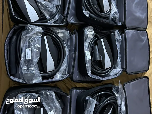 شاحن تسلا أصلي جديد أمريكي + وصلتين سريع 32 و بطيء 12+ ادابتر جديد هديه