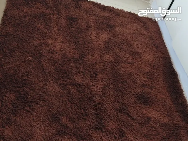 سجادة لون بني