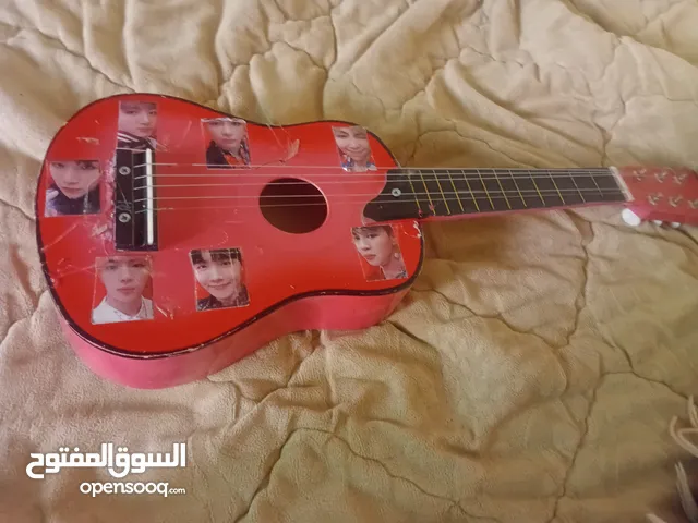 قيتار للأطفال لتنمية مواهبهم بالعزف