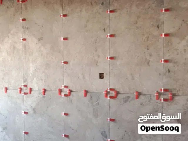 توفيق الهادي لمقاولات وتركيب جميع انواع البلاط  برسلان /سيراميك /رخام/جرانيت/مزايكو