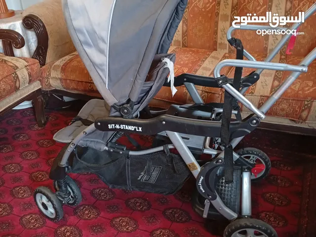 عرباية اطفال امريكي بمقعدين