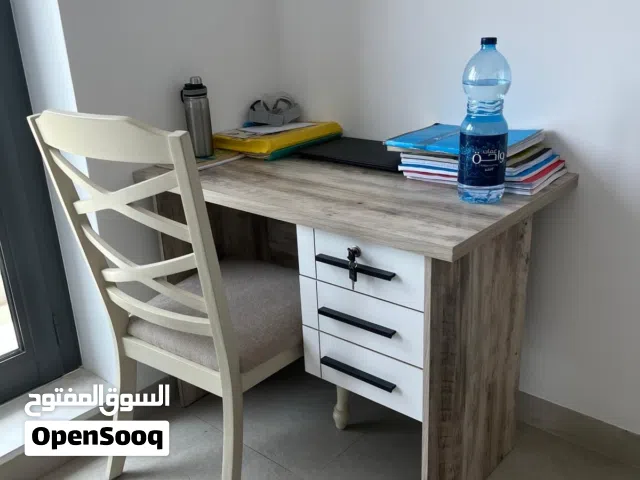 2 desks without chairs