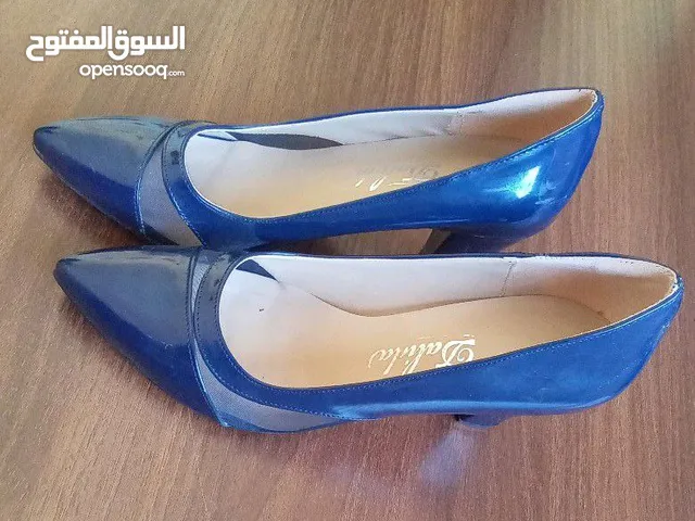 Blue With Heels in Amman