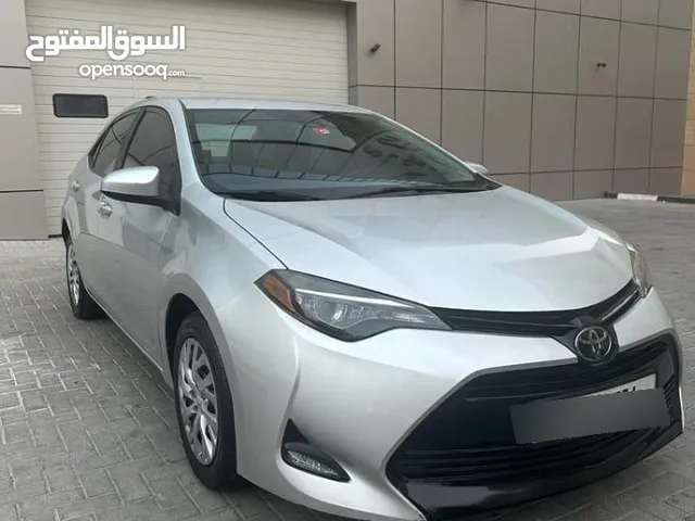 Toyota corolla model 2019 silver white screen economy تويوتا كورولا فضي للبيع قابلة للتفاوض