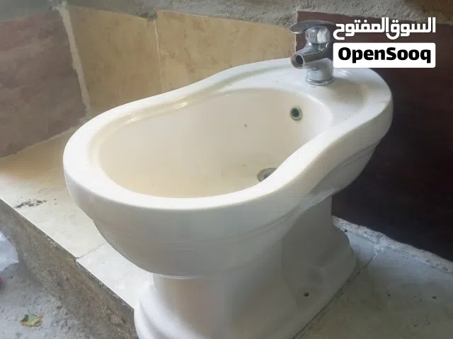 مغسله اقدام مع بطاريتها