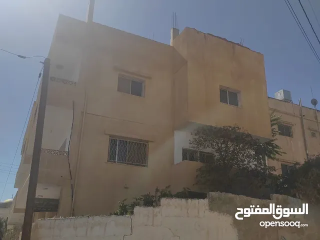 عمارة للاستثمار أو السكن أرض 461م على شارعين 6شقق قديمة بحاجة للصيانة طبربور- الرقم المرجعي 14941