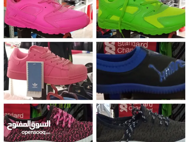 عرض على أحذية رجالي نسائي ولادي في محلنا الرياضي