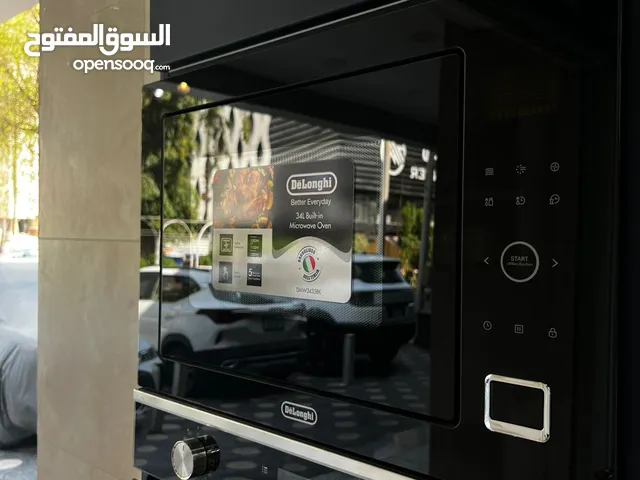 DeLonghi dmw 3435b مايكرويف بضمان سنتان