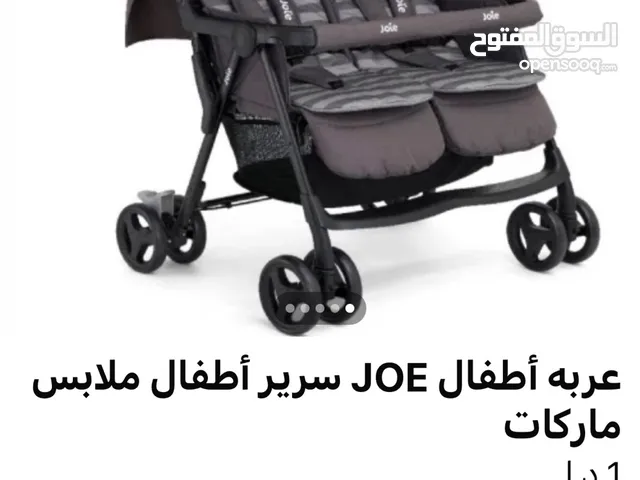 عربه أطفال ماركه joe سرير ايكيا وملابس احذيه أطفال ماركات عالميه شبه جديد وكوت أطفال عدد 2 روبينز