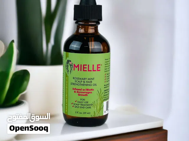 زيت يومي للشعر وفروة الرأس بخلاصة الروزماري والنعناع من ماركة Mielle