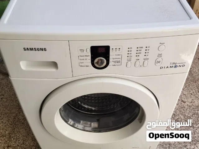 غسالة ملابس اتوماتيك