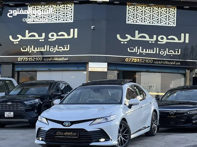 تويوتا كامري 2023 هايبرد فل كامل بانوراما عداد صفر ( قابل للبدل )