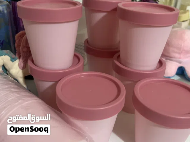 علب بلاستيك للتخزين لون زهري