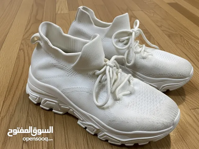 Brand new white shoes