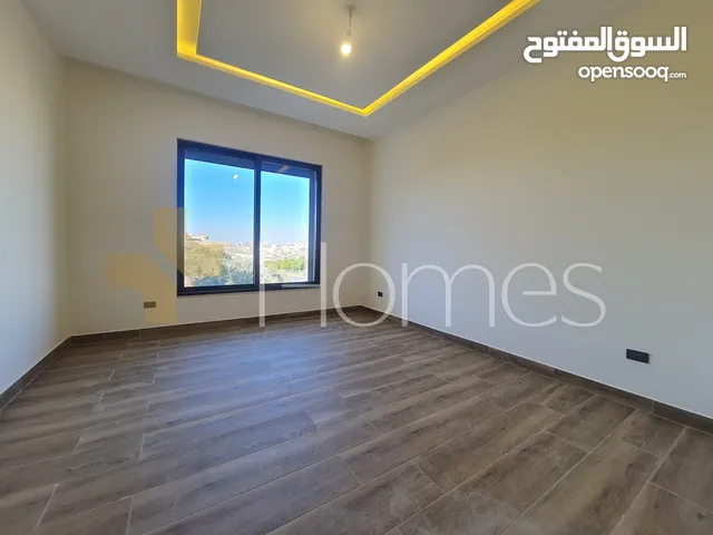 شقة ارضية بمدخل خاص للبيع في رجم عميش بمساحة بناء 235م