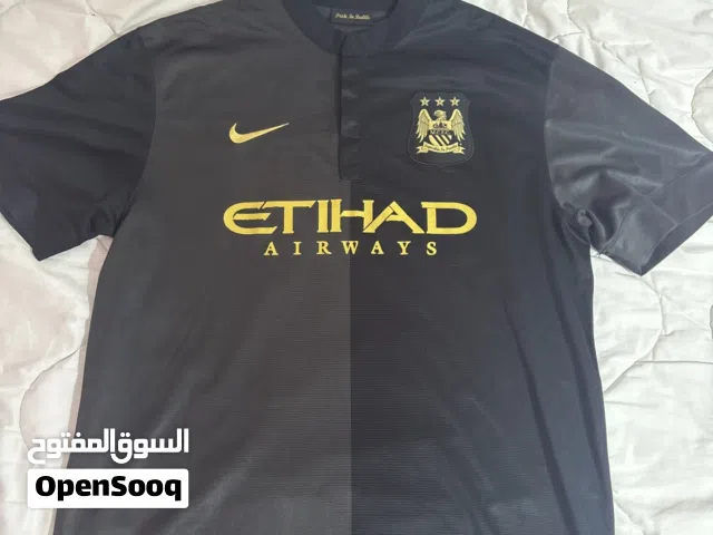 بلوزة Manchester United و Manchester City