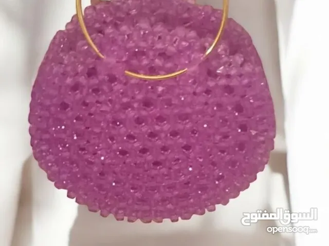جنطة خرز هاندميد لون وردي